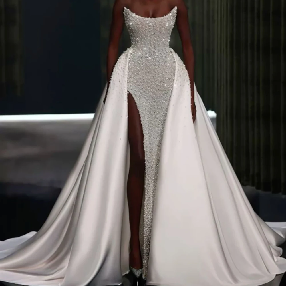 Luxury Pearl Embroidery Strapless Evening Dresses with Slit Covered with Pearls Sleeveless Satin Bridal Gown for Wedding Party
Luxury Pearl Embroidery Strapless Evening Dresses with Slit Covered with Pearls Sleeveless Satin Bridal Gown for Wedding Party