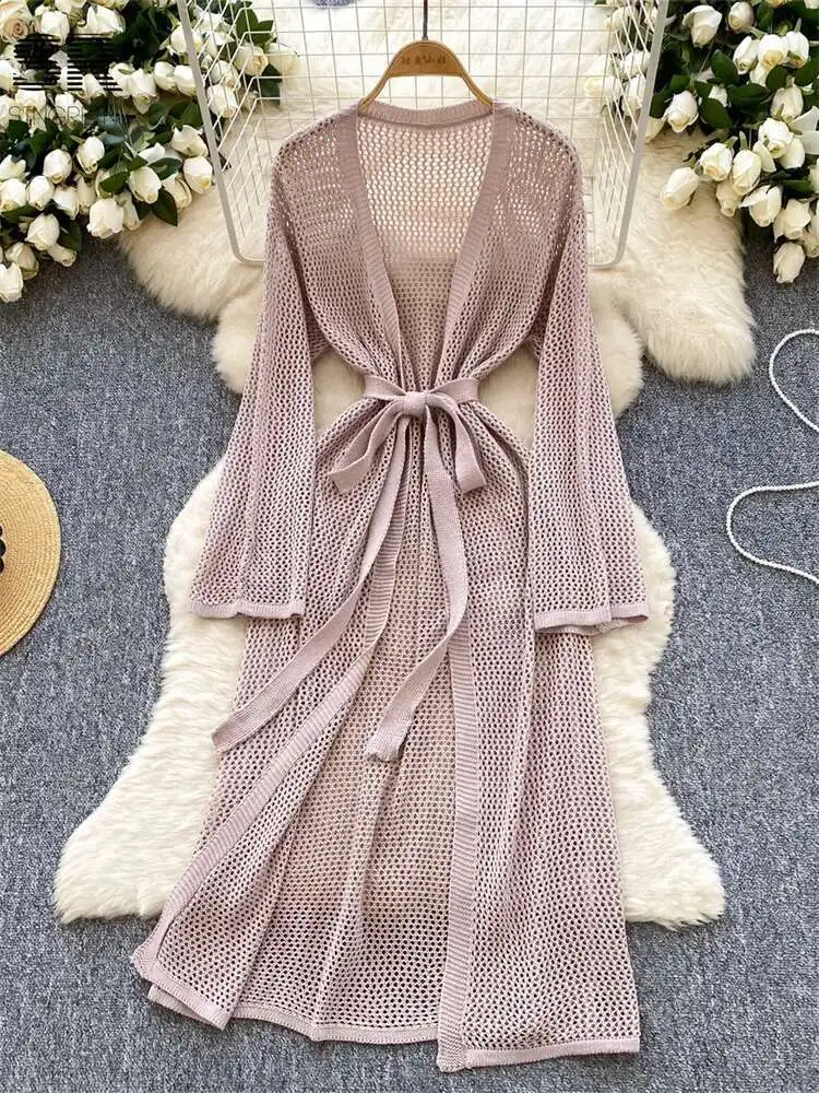 BabYoung Summer Knitted Sun-Proof Shirt Women Long Sleeve Solid Hollow Out Lace Up Design Korean Beach Cardigans
BabYoung Summer Knitted Sun-Proof Shirt Women Long Sleeve Solid Hollow Out Lace Up Design Korean Beach Cardigans