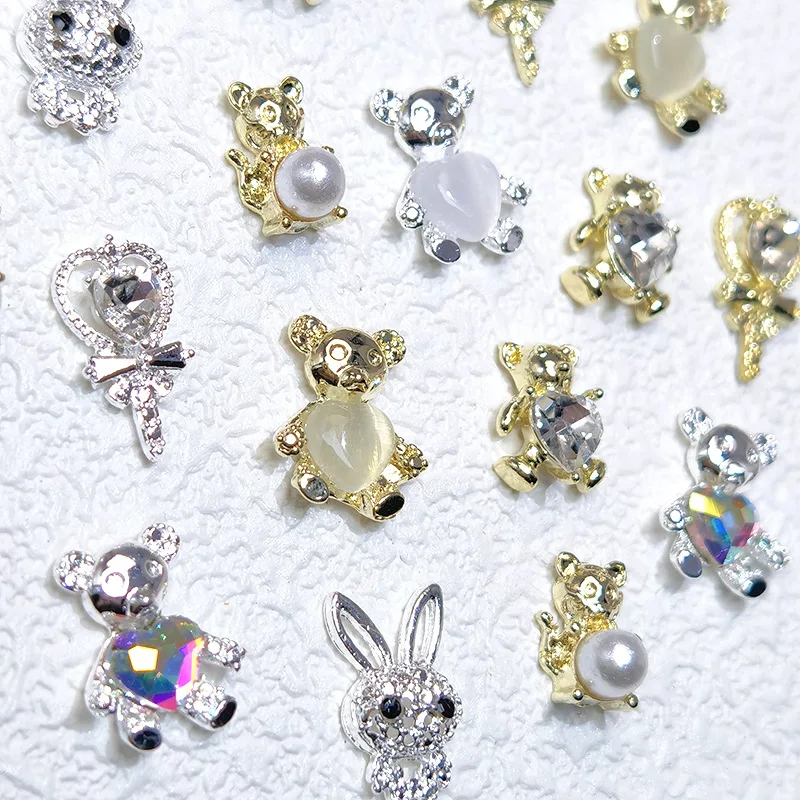 10pcs/lot 2024 New Nail Alloy Bear Jewelry Gold Silver Love Bear Pearl Series Hot selling Alloy Nail Decoration
10pcs/lot 2024 New Nail Alloy Bear Jewelry Gold Silver Love Bear Pearl Series Hot selling Alloy Nail Decoration
