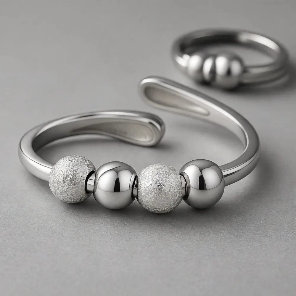 Регулируемое серебряное кольцо-спиннер с бусинами для женщин, антистрессовое украшение
Регулируемое серебряное кольцо-спиннер с бусинами для женщин, антистрессовое украшение