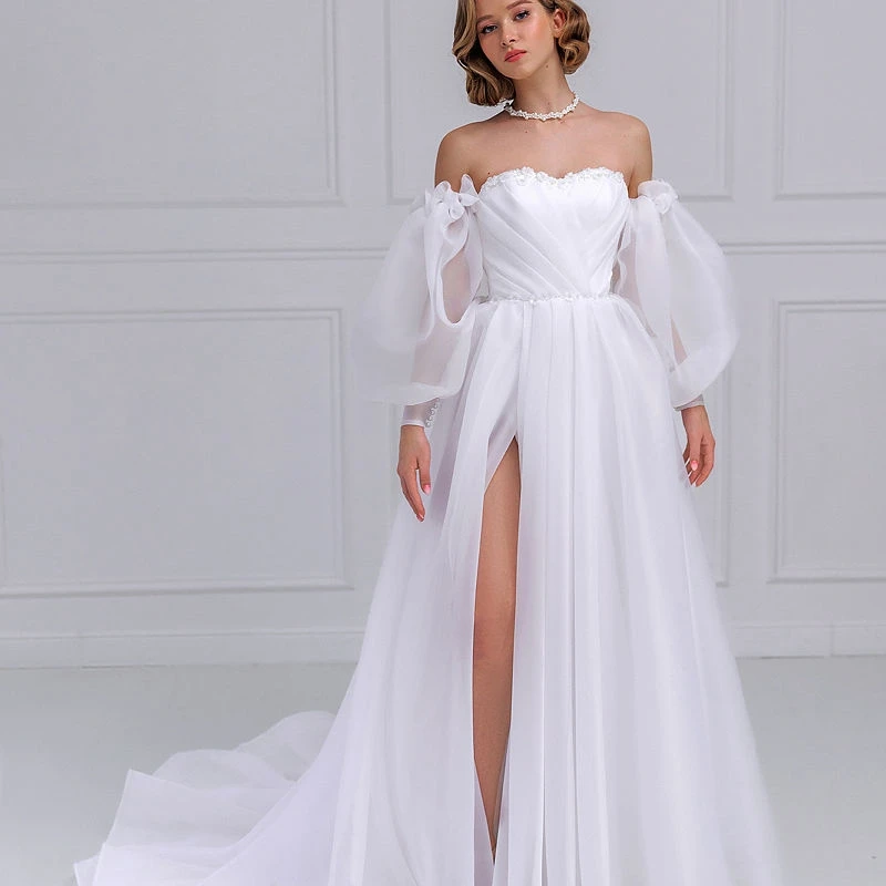 Elegant Tulle A Line Wedding Dress Strapless Lace Up Back with Removable Puff Sleeve High Split Sequined Robe De Mariee
Elegant Tulle A Line Wedding Dress Strapless Lace Up Back with Removable Puff Sleeve High Split Sequined Robe De Mariee