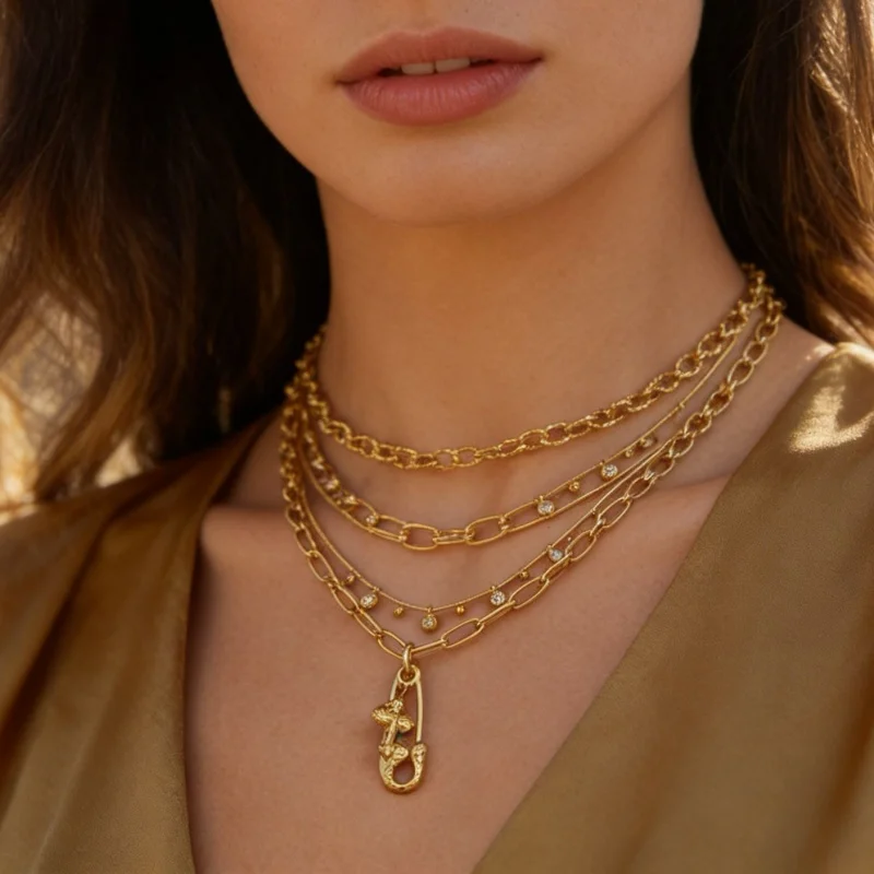 Gold Layered Safety Pin Pendant Necklace Set Textured Chain Stackable Choker with CZ Accents for Women Beach Party Daily Jewelry
Gold Layered Safety Pin Pendant Necklace Set Textured Chain Stackable Choker with CZ Accents for Women Beach Party Daily Jewelry
