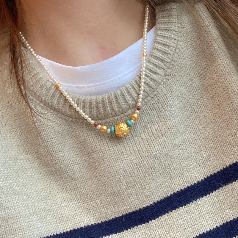 Traditional gold fortune necklace with imitation pearls, versatile and niche, short style, transfer beads necklace, collarbone c
Traditional gold fortune necklace with imitation pearls, versatile and niche, short style, transfer beads necklace, collarbone c
