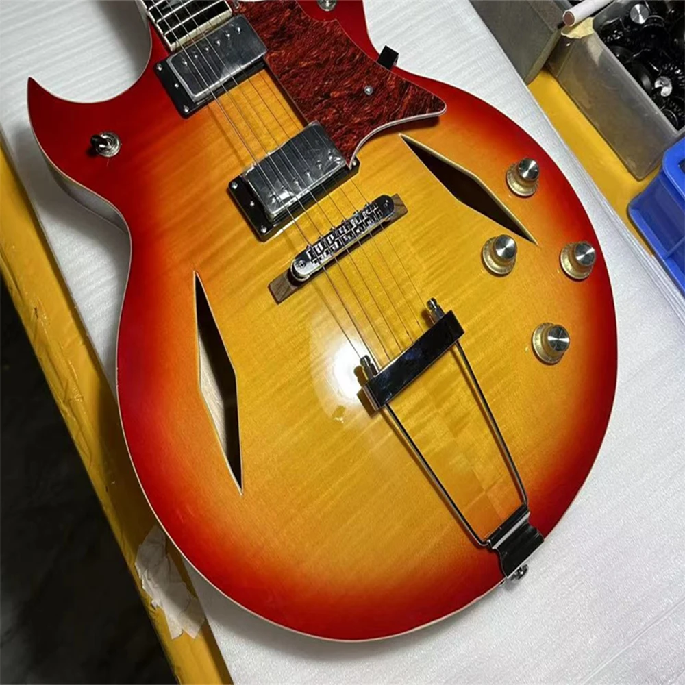 Sunset-Color Half Hollow Body Electric Guitar 6 Strings High Sound Quality Ideal for Beginners & Musicians
Sunset-Color Half Hollow Body Electric Guitar 6 Strings High Sound Quality Ideal for Beginners & Musicians