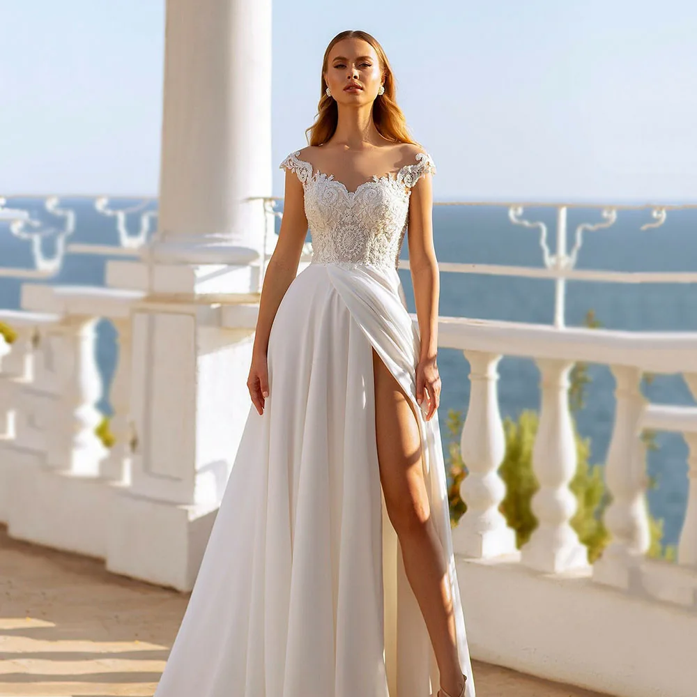 Women's Beides Wedding Dress 2025 Lace Appliques Bride Gown Cap Sleeve Side High Split Sexy Bridal Dress Vestidos De Novia
Women's Beides Wedding Dress 2025 Lace Appliques Bride Gown Cap Sleeve Side High Split Sexy Bridal Dress Vestidos De Novia