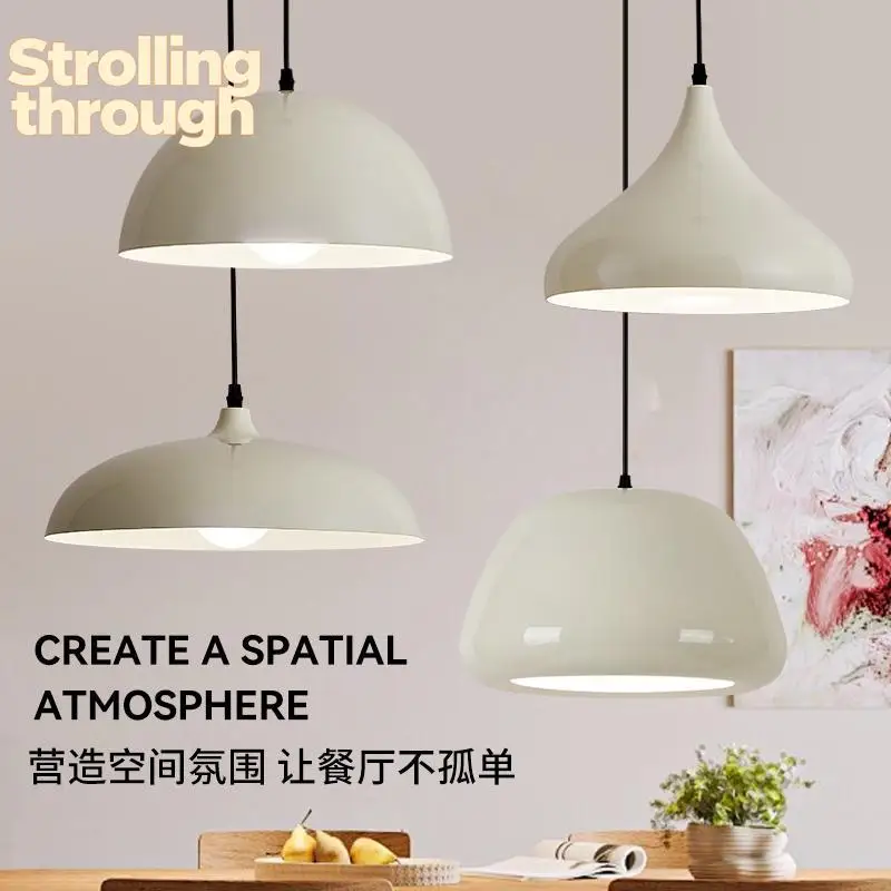 Modern simple restaurant chandelier office single head milk tea shop cafe Nordic style bar counter milk mud color lamps
Modern simple restaurant chandelier office single head milk tea shop cafe Nordic style bar counter milk mud color lamps