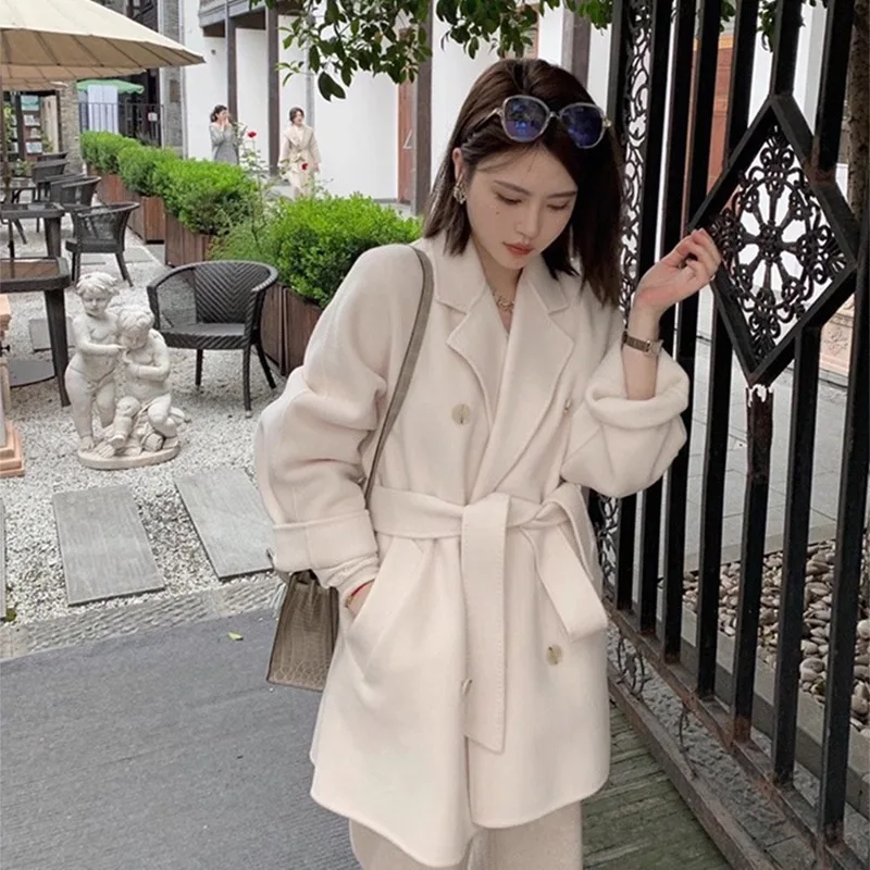 Korean drama female lead double-sided cashmere coat women's short small high-end camel lace-up double-breasted woolen coat
Korean drama female lead double-sided cashmere coat women's short small high-end camel lace-up double-breasted woolen coat