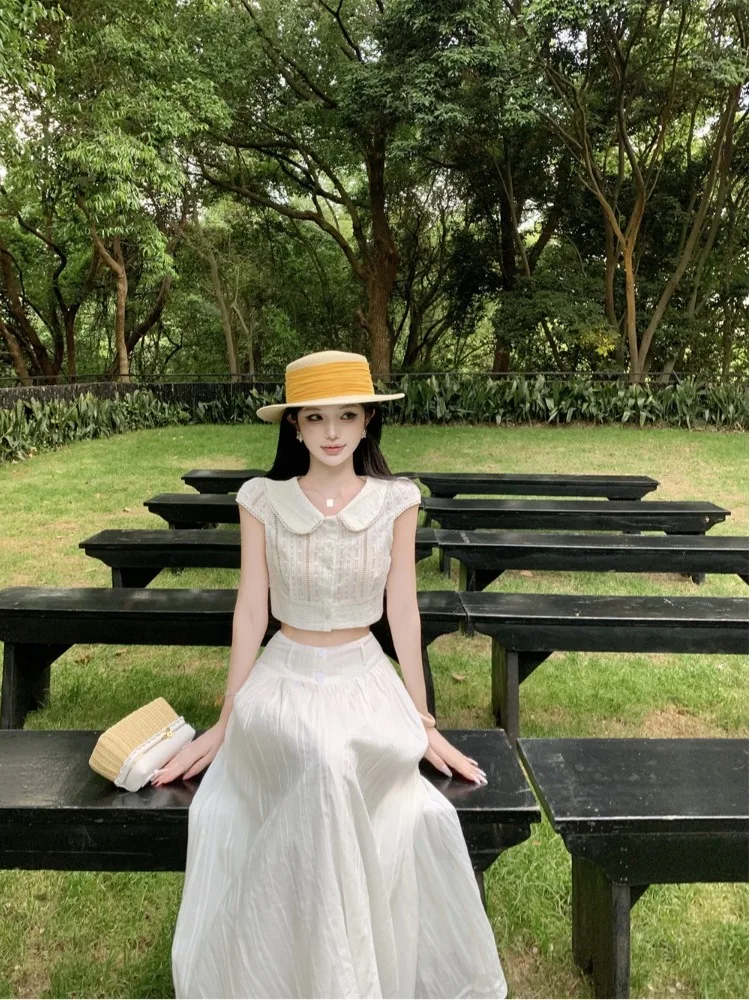 Summer White Embroidered Hollow out Shirt And High Waist Skirt Two Piece Set for Women Country Vacation Style
Summer White Embroidered Hollow out Shirt And High Waist Skirt Two Piece Set for Women Country Vacation Style
