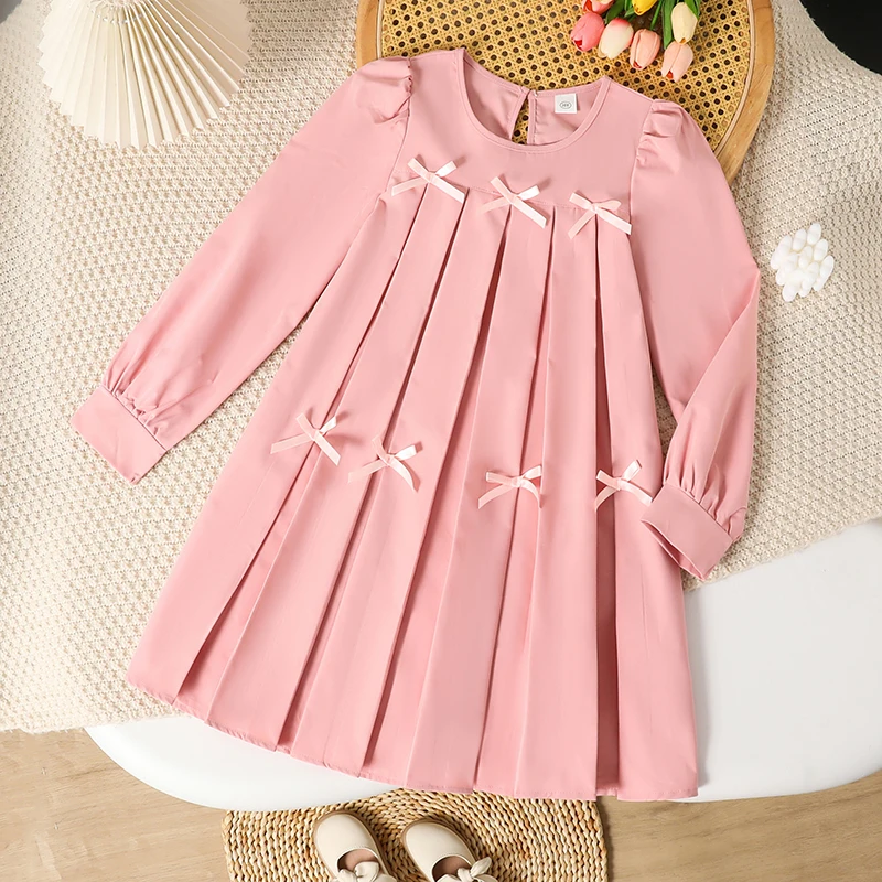 2023 Осенняя новая одежда для девочек, однотонное розовое платье трапециевидной формы с круглым вырезом и бантом, с длинными рукавами для девочек 8–12 лет, милый стиль
2023 Осенняя новая одежда для девочек, однотонное розовое платье трапециевидной формы с круглым вырезом и бантом, с длинными рукавами для девочек 8–12 лет, милый стиль