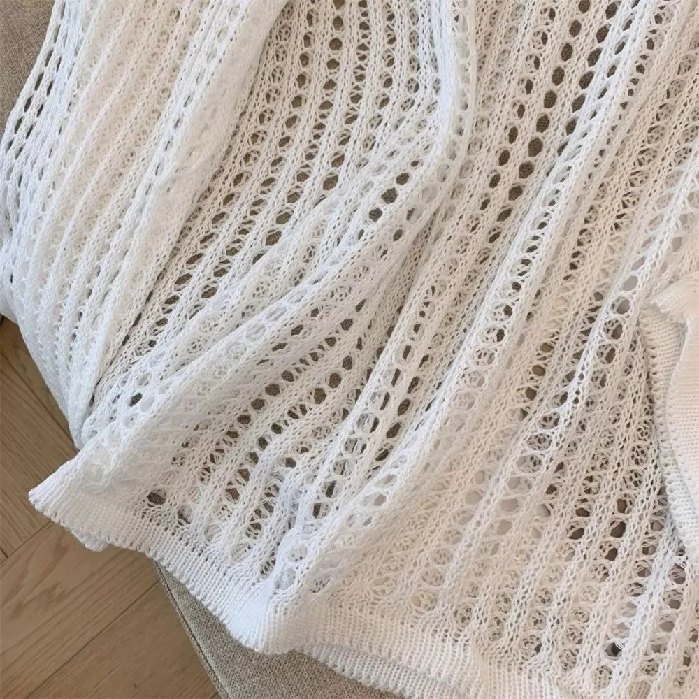 New Hollow Out Long Sleeved Top Solid Color Knitted Round Neck Pullover Loose Versatile Sun Protection Blouse Women
New Hollow Out Long Sleeved Top Solid Color Knitted Round Neck Pullover Loose Versatile Sun Protection Blouse Women