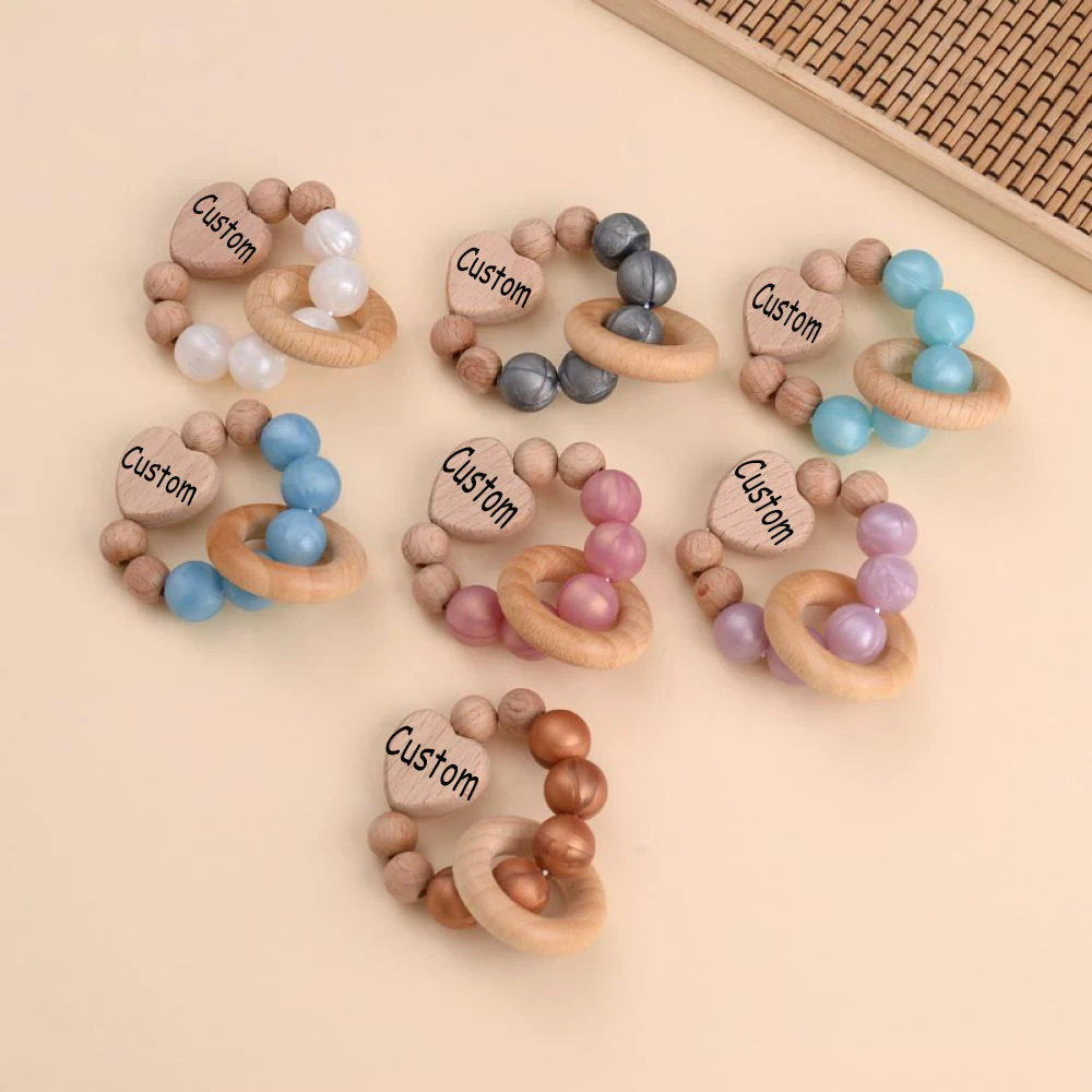 Customized Name Baby Teething Bracelet Wooden Teethers Bracelet Set Cartoon Love Silicone Bead Baby Teething Toy Anti-lost Chain
Customized Name Baby Teething Bracelet Wooden Teethers Bracelet Set Cartoon Love Silicone Bead Baby Teething Toy Anti-lost Chain