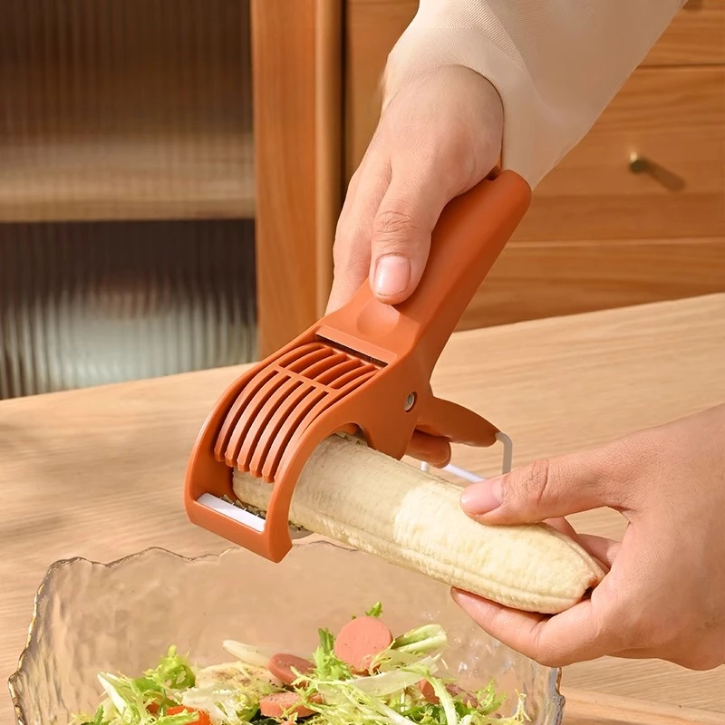 Banana slicer, ham clamp, fruit splitter, creative multi-function cutter, kitchen tool
Banana slicer, ham clamp, fruit splitter, creative multi-function cutter, kitchen tool