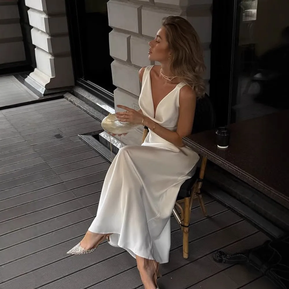 Woman Spaghetti Strap Vacation Temperament Dress Solid Color Vestidos Sexy Backless Long Evening Dress Elegant V-neck Robe
Woman Spaghetti Strap Vacation Temperament Dress Solid Color Vestidos Sexy Backless Long Evening Dress Elegant V-neck Robe