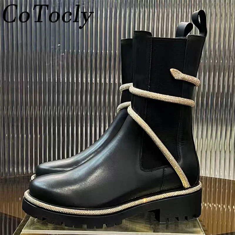 Короткие ботинки из натуральной кожи на толстой подошве, женские полусапожки со змеиным шпагатом и ремешком на щиколотке, удобные черные женские ботинки с круглым носком 
Короткие ботинки из натуральной кожи на толстой подошве, женские полусапожки со змеиным шпагатом и ремешком на щиколотке, удобные черные женские ботинки с круглым носком