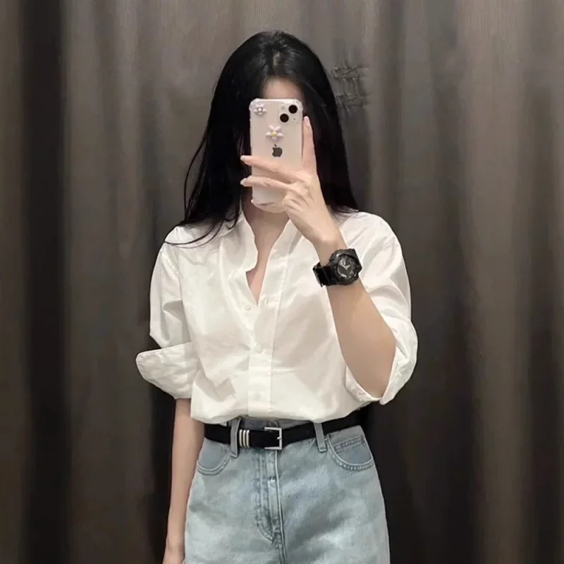 French polo collar white long-sleeved top women's 2025 early spring new chic unique design niche shirt
French polo collar white long-sleeved top women's 2025 early spring new chic unique design niche shirt