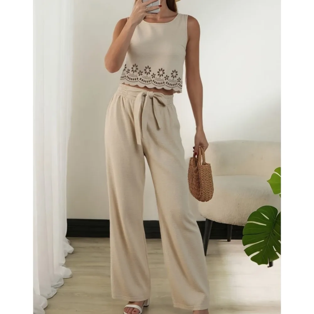 Fashion Hollow O Neck Sleeveless Top Women's Suit New Fashion Lace Wide Leg Trousers Women's Vacation Vest Trousers 2 Piece Suit
Fashion Hollow O Neck Sleeveless Top Women's Suit New Fashion Lace Wide Leg Trousers Women's Vacation Vest Trousers 2 Piece Suit
