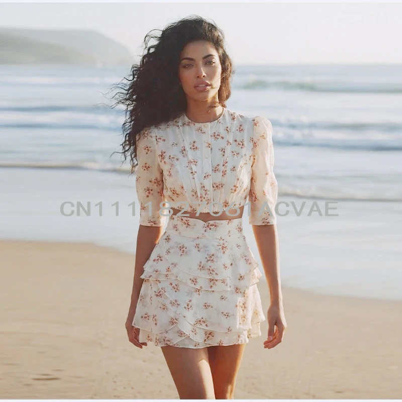 Floral Print Women's Two Piece Set Puff Sleeve Crop Top Layered Ruffle Mini Skirt Set Lady 2026 Summer Woman Boho Beach Outfit
Floral Print Women's Two Piece Set Puff Sleeve Crop Top Layered Ruffle Mini Skirt Set Lady 2026 Summer Woman Boho Beach Outfit