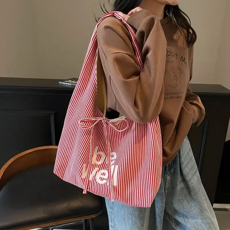 HAEX Fashion Women Tote Bags Large Capacity Letter Print 2 Sides Shoulder Bag Female Casual Daily Commute Canvas Bolso Mujer
HAEX Fashion Women Tote Bags Large Capacity Letter Print 2 Sides Shoulder Bag Female Casual Daily Commute Canvas Bolso Mujer