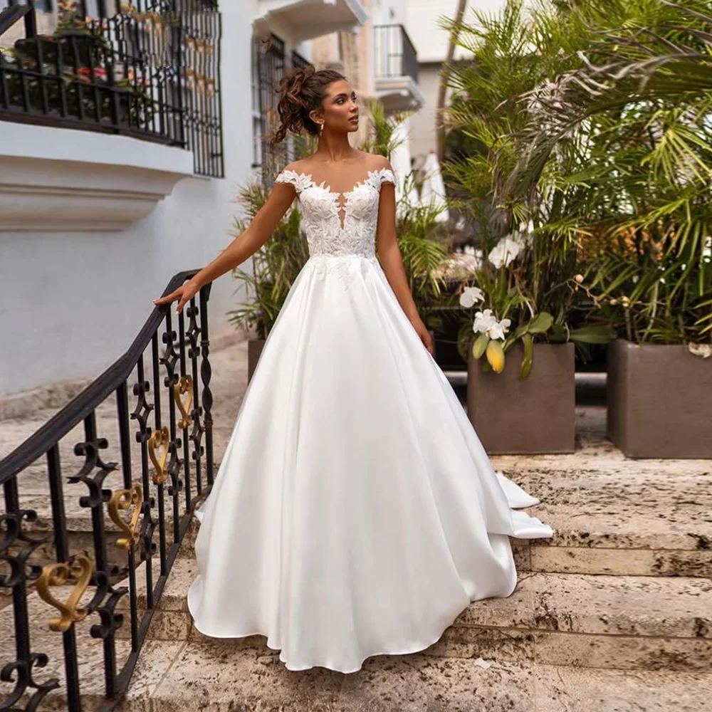 Flavinke Customized Boho Sheer Neck A-line Satin Wedding Party Dresses Lace Court Sleeveless Bridal Wedding Vestido de novia
Flavinke Customized Boho Sheer Neck A-line Satin Wedding Party Dresses Lace Court Sleeveless Bridal Wedding Vestido de novia