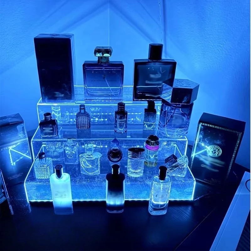 Clear Acrylic Display Lifter Shelf with Light Emitting Diode Light 3 Layer Display Ladder Shelf Stand Perfume Storage
Clear Acrylic Display Lifter Shelf with Light Emitting Diode Light 3 Layer Display Ladder Shelf Stand Perfume Storage