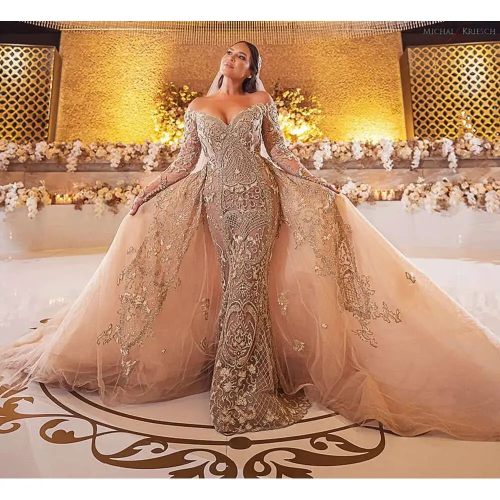 Индивидуальные арабские кружевные свадебные платья Aso Ebi 2025, кристаллы с прозрачным вырезом и длинными рукавами, винтажное сексуальное свадебное платье
Индивидуальные арабские кружевные свадебные платья Aso Ebi 2025, кристаллы с прозрачным вырезом и длинными рукавами, винтажное сексуальное свадебное платье