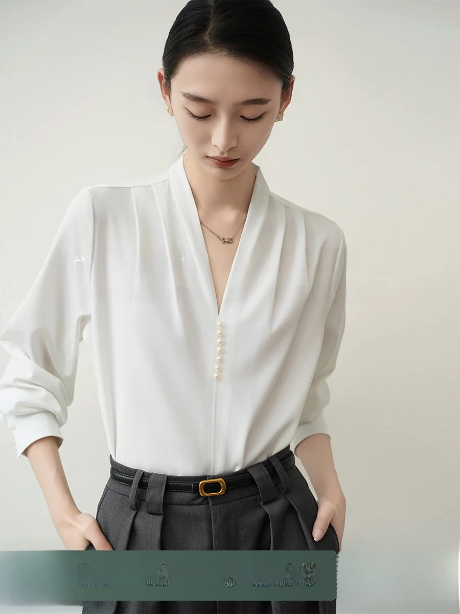 Ele Satin irt Женский шикарный жемчужный детали белого цвета с V-образным вырезом для работы на работу и профессиональном верху, длинный све, полиэстер...
Ele Satin irt Женский шикарный жемчужный детали белого цвета с V-образным вырезом для работы на работу и профессиональном верху, длинный све, полиэстер...