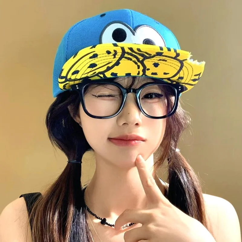 Cartoon Big Eyes Embroidered Flat brimmed Baseball Hat for Summer Look Small American Hip Hop Street Big brimmed Duck Tongue Hat
Cartoon Big Eyes Embroidered Flat brimmed Baseball Hat for Summer Look Small American Hip Hop Street Big brimmed Duck Tongue Hat
