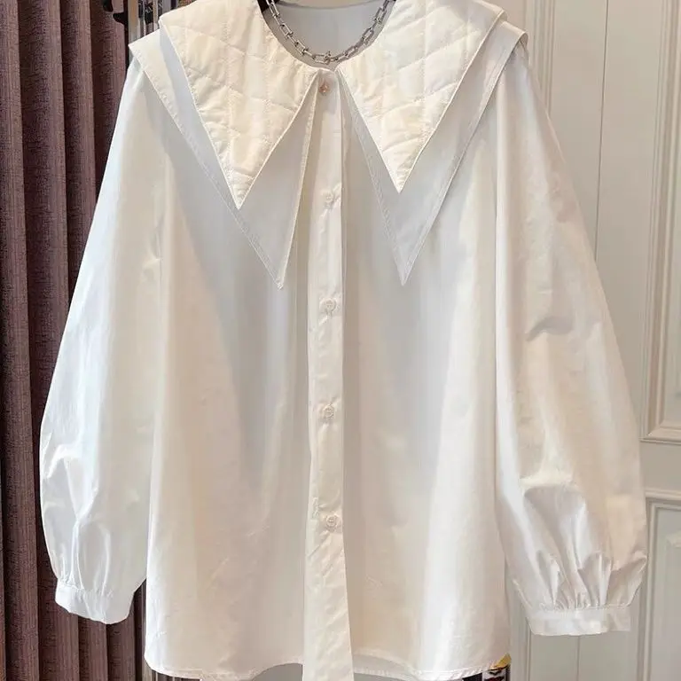 French unique design niche loose casual double layered large pointed collar shirt, women's spring white doll neck top
French unique design niche loose casual double layered large pointed collar shirt, women's spring white doll neck top