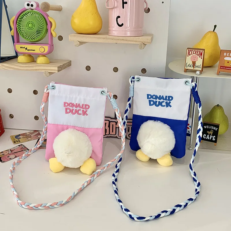 New Disney cartoon Donald duck Women handbag Minnie Shoulder Diagonal Bag Casual Fashion Girl PU Round Bag Birthday Gifts
New Disney cartoon Donald duck Women handbag Minnie Shoulder Diagonal Bag Casual Fashion Girl PU Round Bag Birthday Gifts