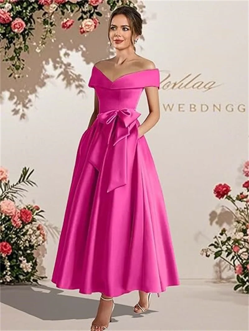 Customized Women's Off The Shoulder Satin Mother of The Bride Dress with Bow Tea Lenght Formal Evening Gowns with Pockets
Customized Women's Off The Shoulder Satin Mother of The Bride Dress with Bow Tea Lenght Formal Evening Gowns with Pockets