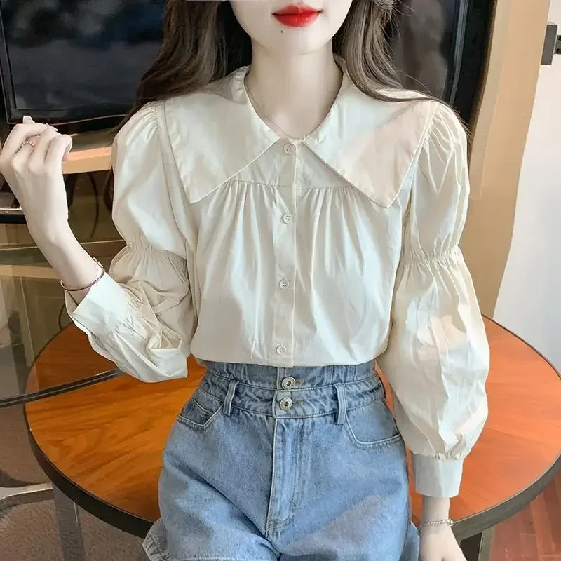 Early Autumn Baby Collar Shirt Women's Autumn Outfit New Long Sleeved Top Design Bubble Sleeves Age Reducing Temperament
Early Autumn Baby Collar Shirt Women's Autumn Outfit New Long Sleeved Top Design Bubble Sleeves Age Reducing Temperament