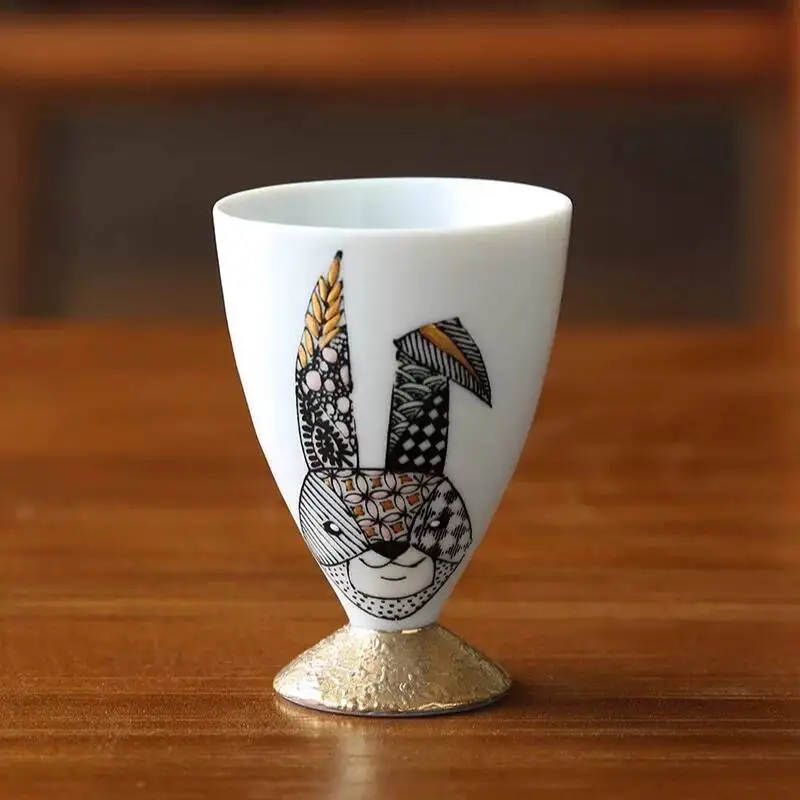 Japanese Ceramic Artist Kitamura Kazuo's Hand-Painted Gold Foil Rabbit High-Footed Wine Glass, High-End Wineware, Sake Glass In
Japanese Ceramic Artist Kitamura Kazuo's Hand-Painted Gold Foil Rabbit High-Footed Wine Glass, High-End Wineware, Sake Glass In