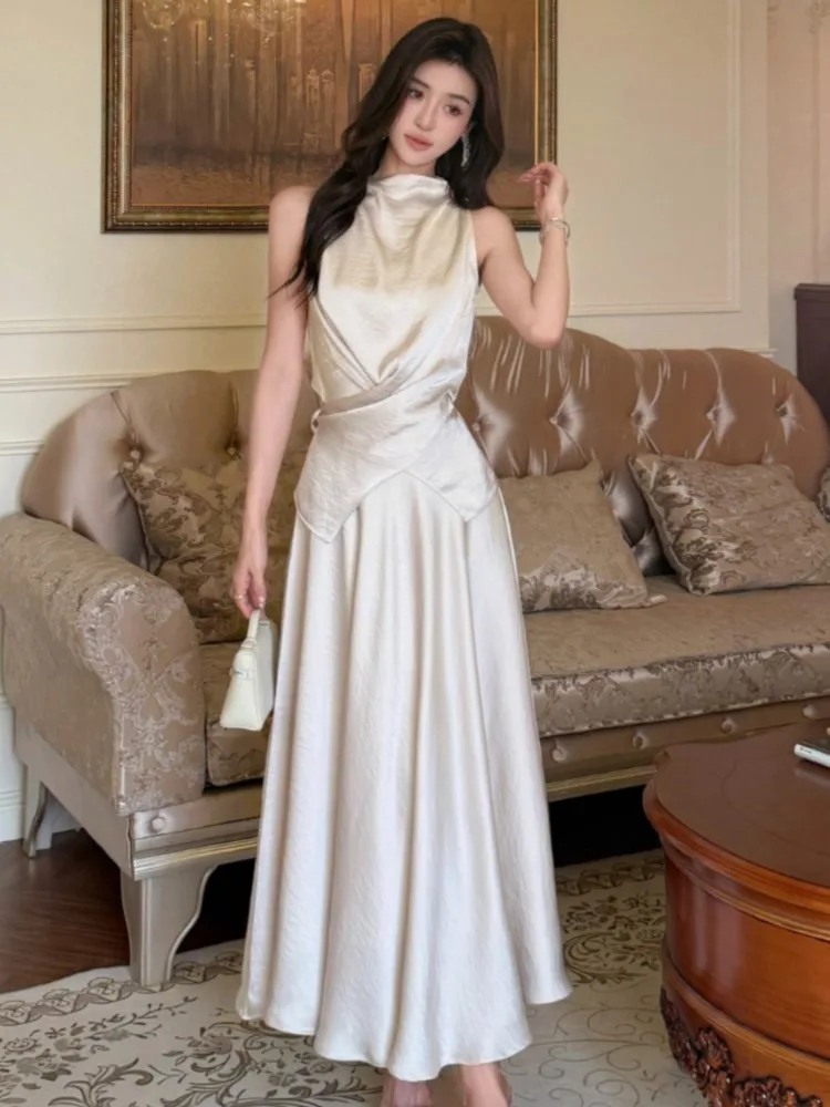 Elegant Solid Satin Skirt Suits Sleeveless Lace-up Casual Top High Waist A-line Skirt Womens Two Pieces Set Female Clothing New
Elegant Solid Satin Skirt Suits Sleeveless Lace-up Casual Top High Waist A-line Skirt Womens Two Pieces Set Female Clothing New