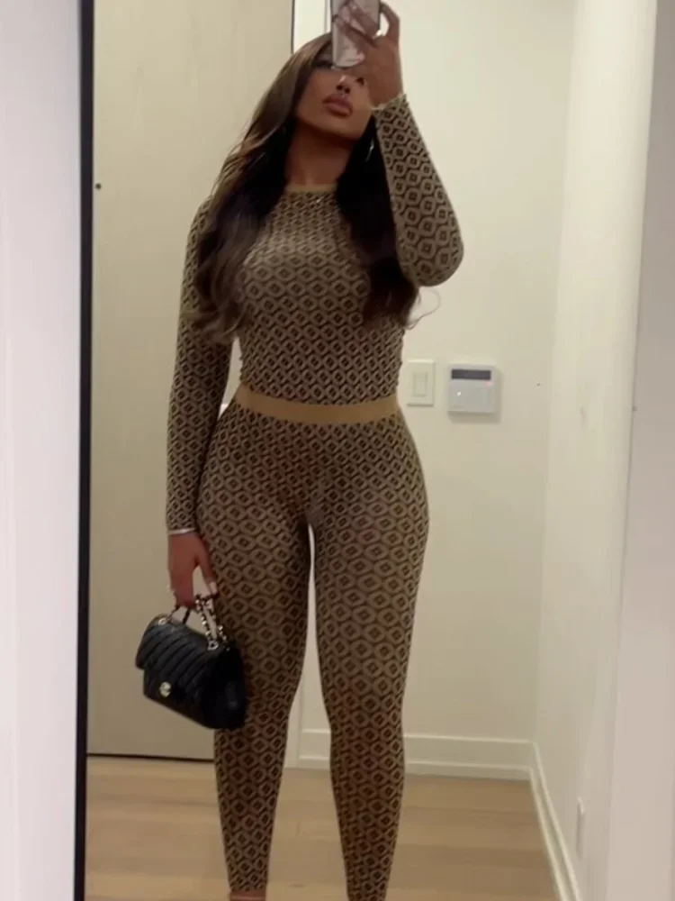 Fashion Printed Slim Fit Sexy Elastic Women Pants Set Chic Round Neck Full Sleeve Short Top Suit 2025 Lady Spring New Outfits
Fashion Printed Slim Fit Sexy Elastic Women Pants Set Chic Round Neck Full Sleeve Short Top Suit 2025 Lady Spring New Outfits