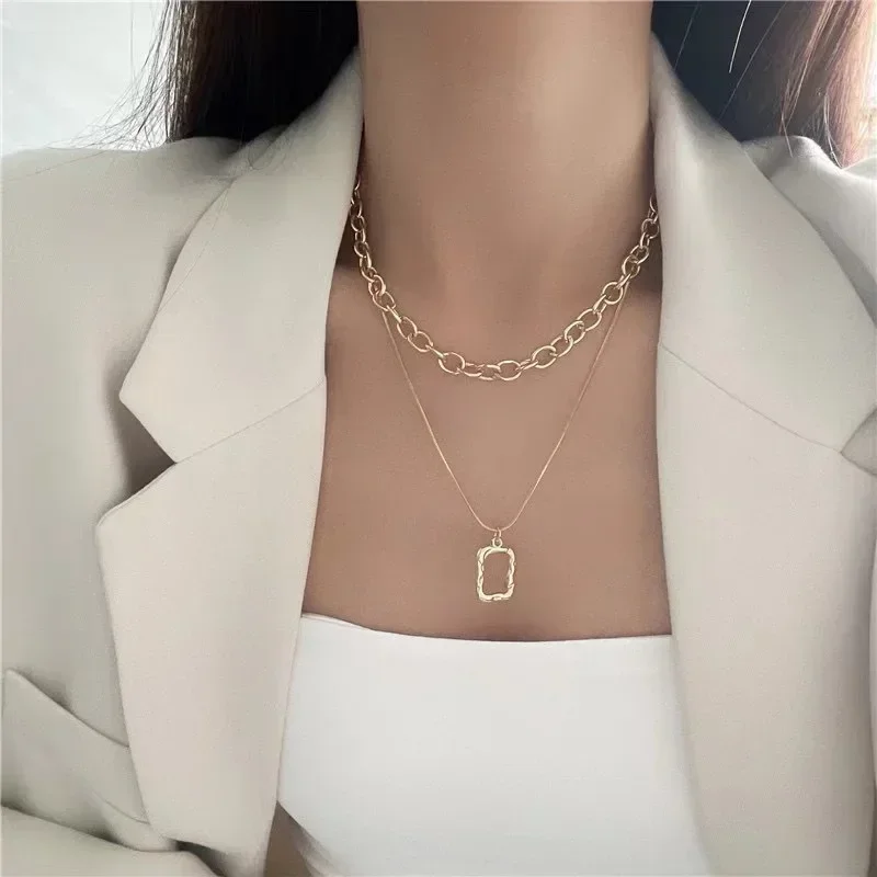European and American simple double-layer hollow square necklace temperament niche metal geometric stacked clavicle chain
European and American simple double-layer hollow square necklace temperament niche metal geometric stacked clavicle chain
