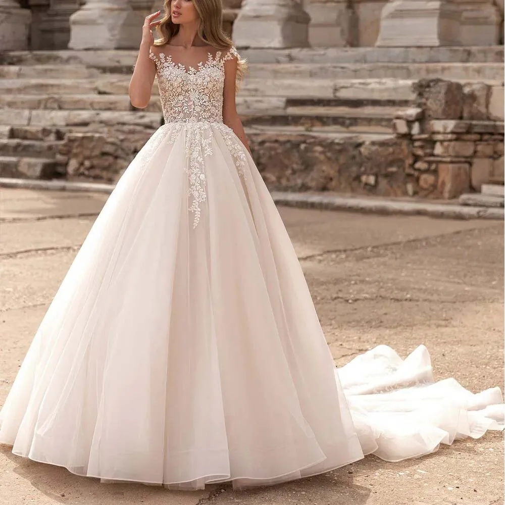 Customized vestido de novia miaminovias Sheer Neck Cap Sleeve Bridal Gown Tulle Ball Gown Wedding Dress with Lace Appliques
Customized vestido de novia miaminovias Sheer Neck Cap Sleeve Bridal Gown Tulle Ball Gown Wedding Dress with Lace Appliques