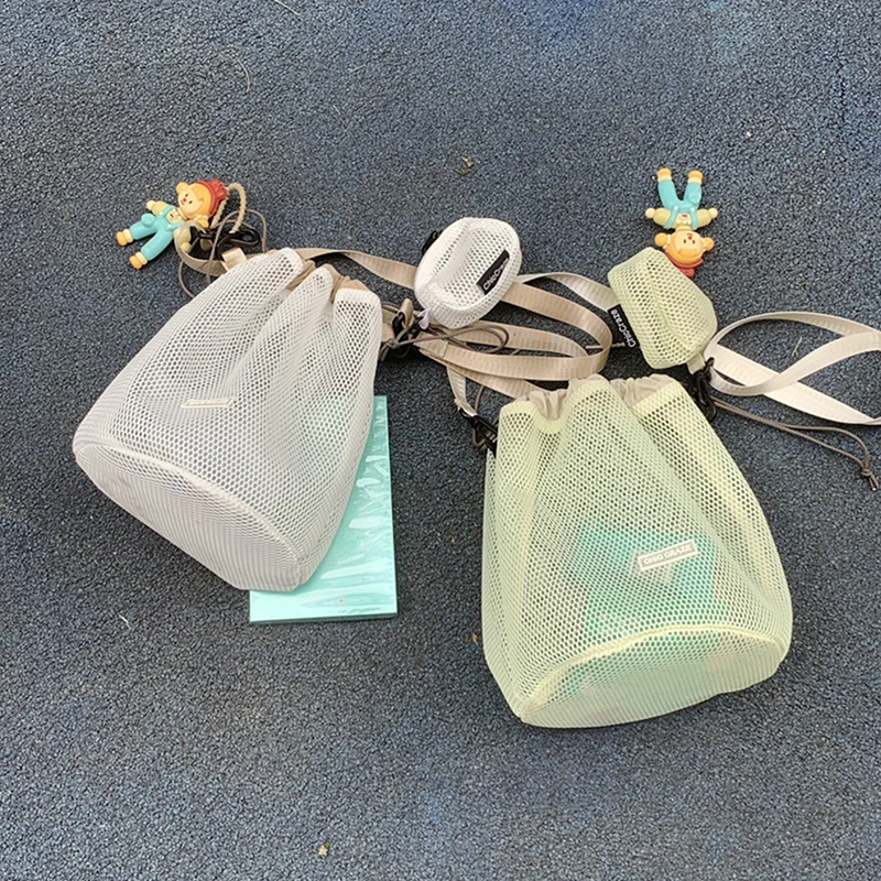 Korean Style Drawstring Bucket Bag With Coin Purse Pendant Mesh Shoulder Bag Solid Color Mobile Phone Bag
Korean Style Drawstring Bucket Bag With Coin Purse Pendant Mesh Shoulder Bag Solid Color Mobile Phone Bag
