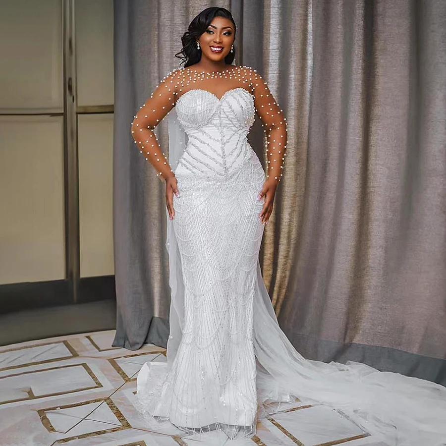 2024 Luxury Pearls Plus Size Mermaid Wedding Gowns With Detachable Train Lace Appliques Bridal Dress Long Sleeves Robe De Mariee
2024 Luxury Pearls Plus Size Mermaid Wedding Gowns With Detachable Train Lace Appliques Bridal Dress Long Sleeves Robe De Mariee
