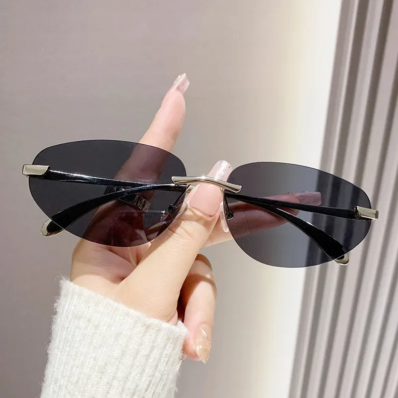 Metal Frameless Oval Cat Eye Sunglasses for Women Retro UV400 Eye Protection UV Protection Fashionable and Personalized Glasses
Metal Frameless Oval Cat Eye Sunglasses for Women Retro UV400 Eye Protection UV Protection Fashionable and Personalized Glasses