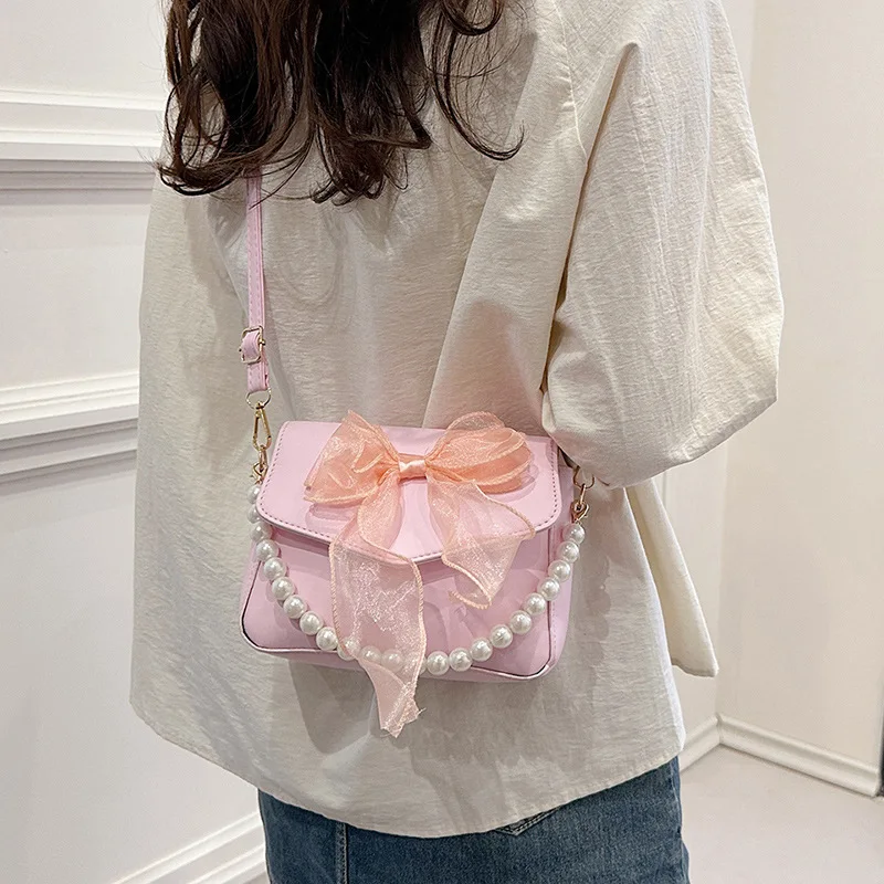 Fashion Women's Small Crossbody Shoulder Bags Lady PU Leather Messenger Bag Bow Pearls Handbags And Purses Girls Flap Travel Bag
Fashion Women's Small Crossbody Shoulder Bags Lady PU Leather Messenger Bag Bow Pearls Handbags And Purses Girls Flap Travel Bag