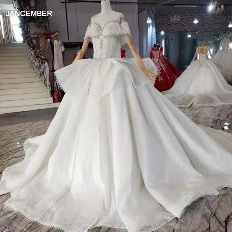 LSLT02 Ball Gown crystal luxury evening dress sleeveless lace wedding dress Appliques white satin wedding dress sukienka weselna
LSLT02 Ball Gown crystal luxury evening dress sleeveless lace wedding dress Appliques white satin wedding dress sukienka weselna