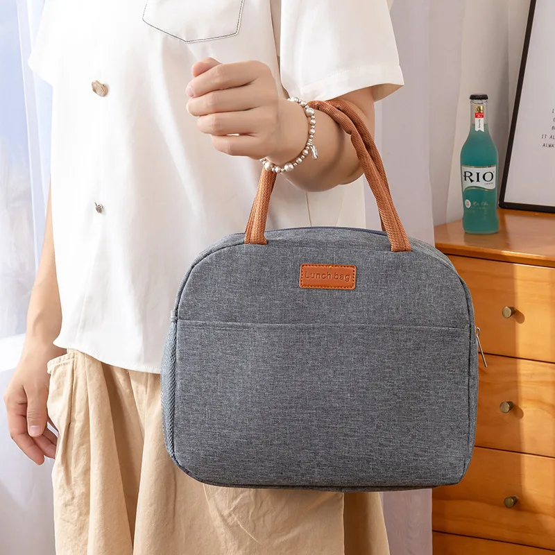 Хит продаж, изолированная сумка для обеда большой емкости, сумка для обеда из утолщенной алюминиевой фольги, портативная сумка для пикника на открытом воздухе
Хит продаж, изолированная сумка для обеда большой емкости, сумка для обеда из утолщенной алюминиевой фольги, портативная сумка для пикника на открытом воздухе