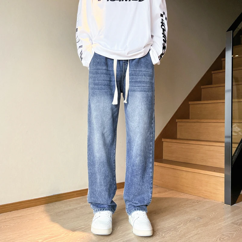 Американские мужские джинсы на шнурке в стиле ретро весной и осенью, стираные водой, свободные и универсальные, мужские джинсовые брюки.
Американские мужские джинсы на шнурке в стиле ретро весной и осенью, стираные водой, свободные и универсальные, мужские джинсовые брюки.