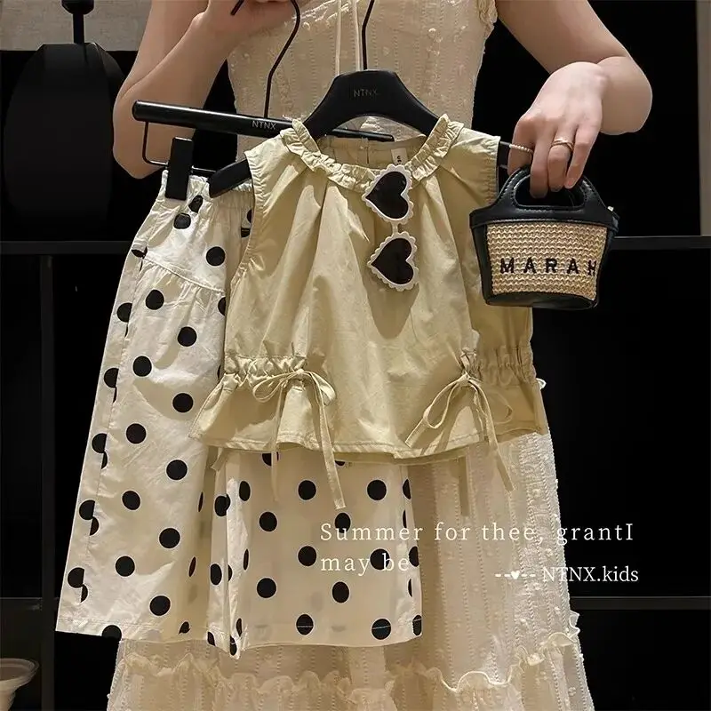 Girls' two-piece summer new style children's polka dot Korean cotton vest shorts set
Girls' two-piece summer new style children's polka dot Korean cotton vest shorts set