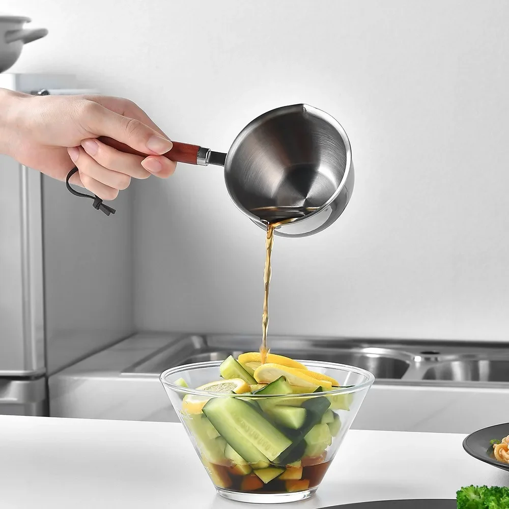 Stainless steel oil splashing pot household three-layer steel hot oil small pot mini oil splashing pot
Stainless steel oil splashing pot household three-layer steel hot oil small pot mini oil splashing pot