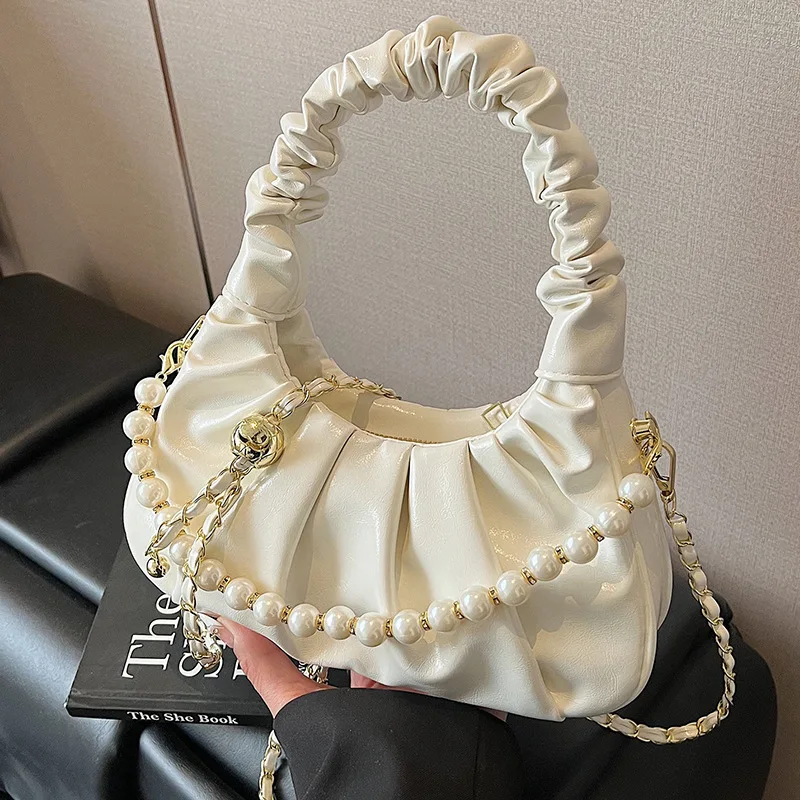 French Solid PU Half Moon Hand Bags Fashion Chains Pearl Beading Designer Style Shoulder Crossbody Bags For Women 2025 Hot Sale
French Solid PU Half Moon Hand Bags Fashion Chains Pearl Beading Designer Style Shoulder Crossbody Bags For Women 2025 Hot Sale