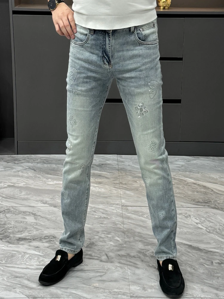 Spring Summer New Casual Jeans Men's Fashion Slim Fit Printed Small Foot Pants High Sensation Long Pants Metal Decoration
Spring Summer New Casual Jeans Men's Fashion Slim Fit Printed Small Foot Pants High Sensation Long Pants Metal Decoration