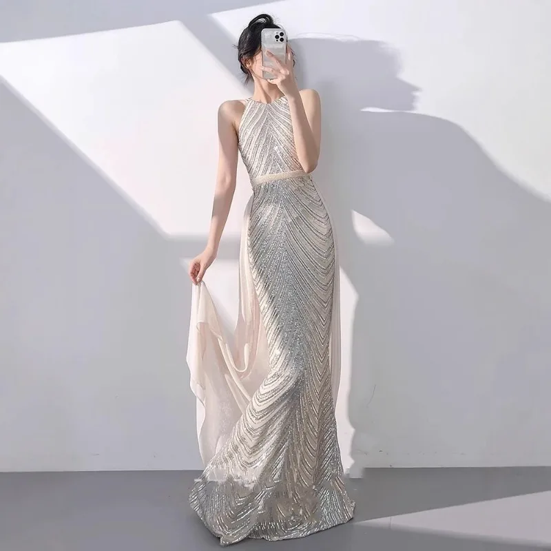 Вечернее платье с женственным темпераментом, новый белый темперамент с рыбьим хвостом и пайетками, высококачественное нишевое платье с подвесным вырезом
Вечернее платье с женственным темпераментом, новый белый темперамент с рыбьим хвостом и пайетками, высококачественное нишевое платье с подвесным вырезом