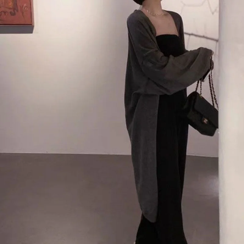 Удлиненный черный женский зимний кардиган оверсайз с отложным воротником на пуговицах, теплый, свободного кроя, в корейском стиле, с высоким воротником-стойкой и капюшоном
Удлиненный черный женский зимний кардиган оверсайз с отложным воротником на пуговицах, теплый, свободного кроя, в корейском стиле, с высоким воротником-стойкой и капюшоном