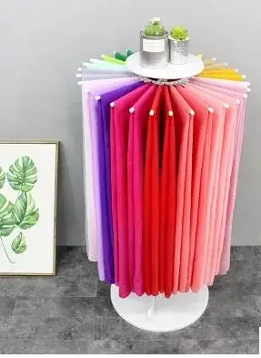 Scarf shelf. Floor display rack. Display shelves of silk scarves. Multi-functional circular rotating frame
Scarf shelf. Floor display rack. Display shelves of silk scarves. Multi-functional circular rotating frame
